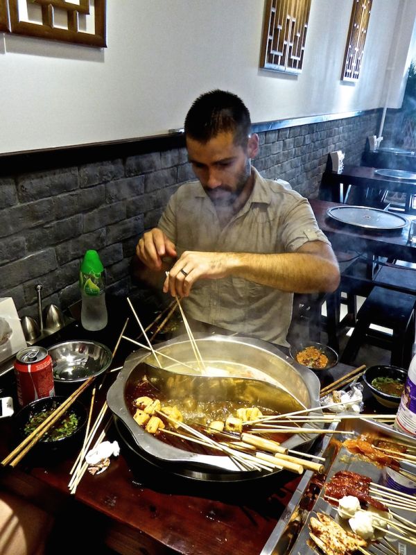 Trying Sichuan hot pot with two broths in Beijing