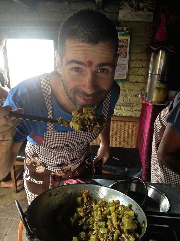 Sebastien showing off the completed vegetable curry