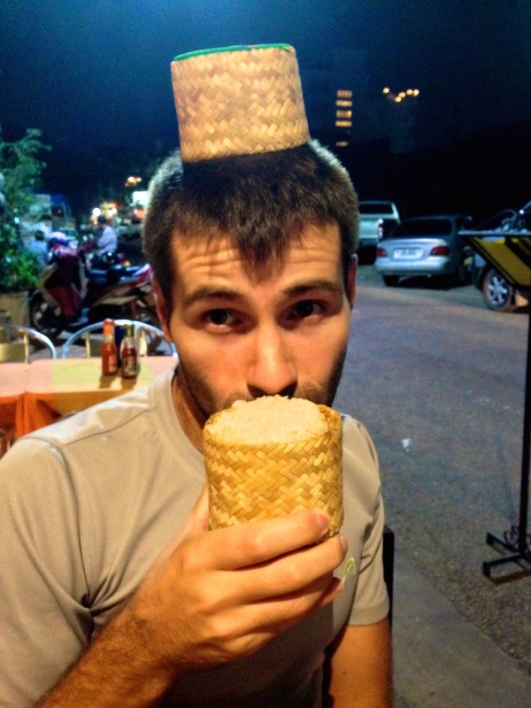 Sebastien discovering sticky rice in Vientiane, Laos