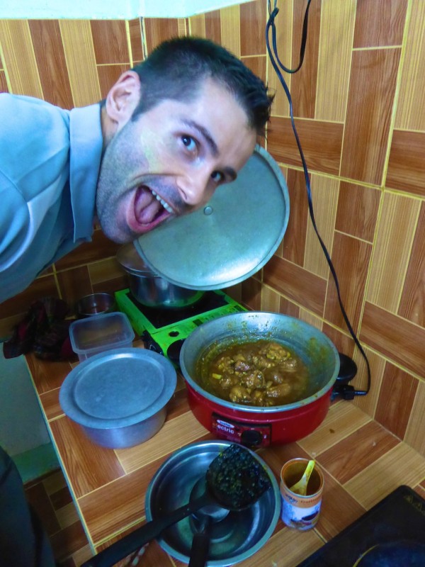 Sebastien cooking Burmese chicken curry