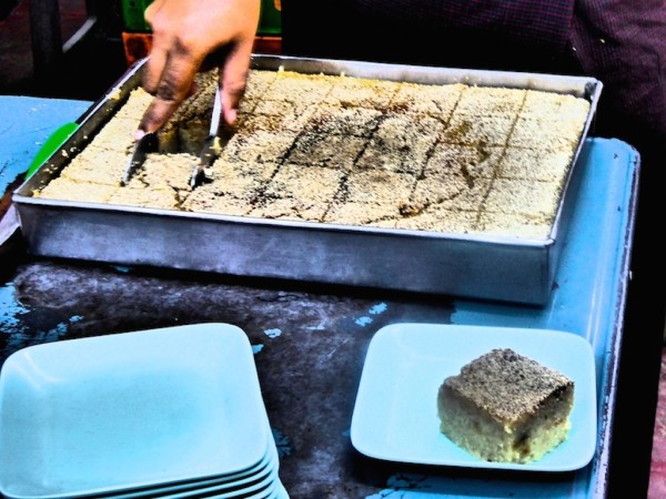 Freshly made semolina cakes in a Yangon tea house