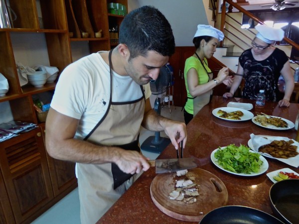 Stefan slicing the pork for the Cao Lau