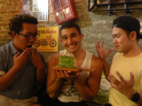 Stefan with pandan gula apong cake in Kuching Sarawak Malaysia