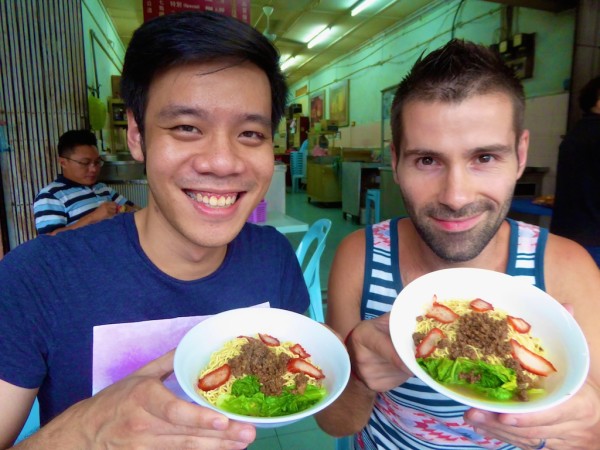 Seb and Brendan trying mee kolok in Kuching Sarawak Malaysia