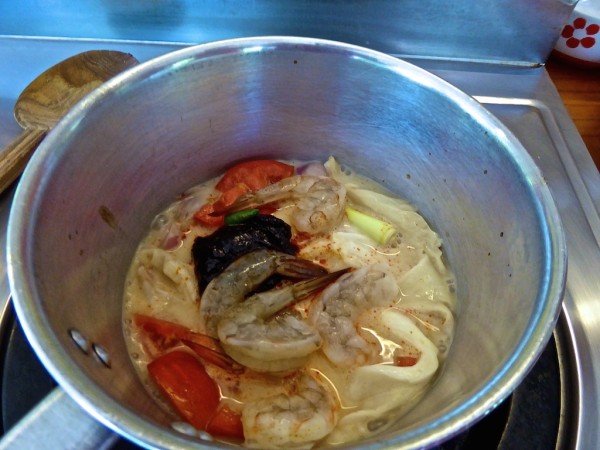 Thai tom yam ingredients in pan cooking class Chiang Mai